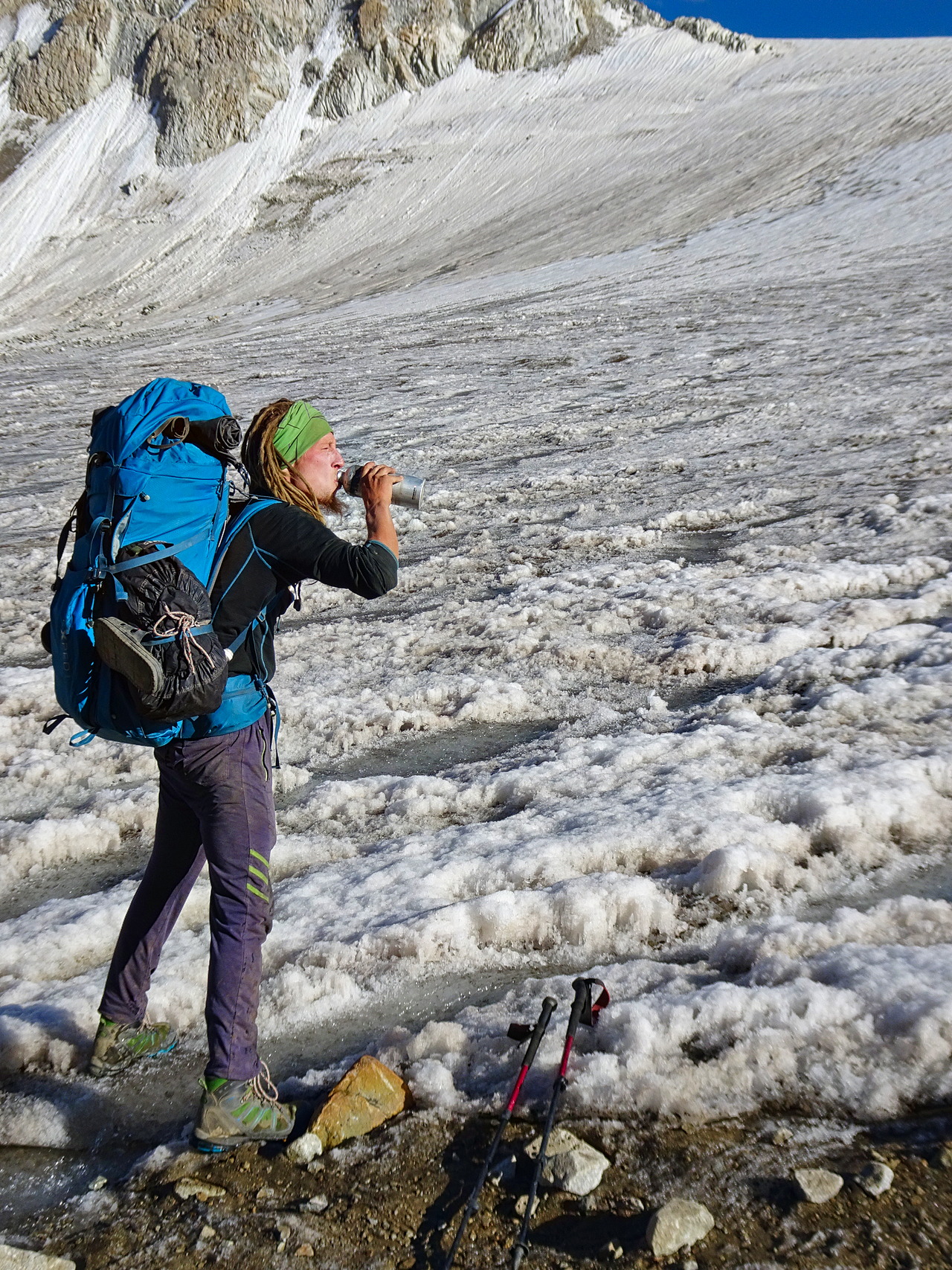 Drinking fresh water from a glacier on top of Garumdee Pass